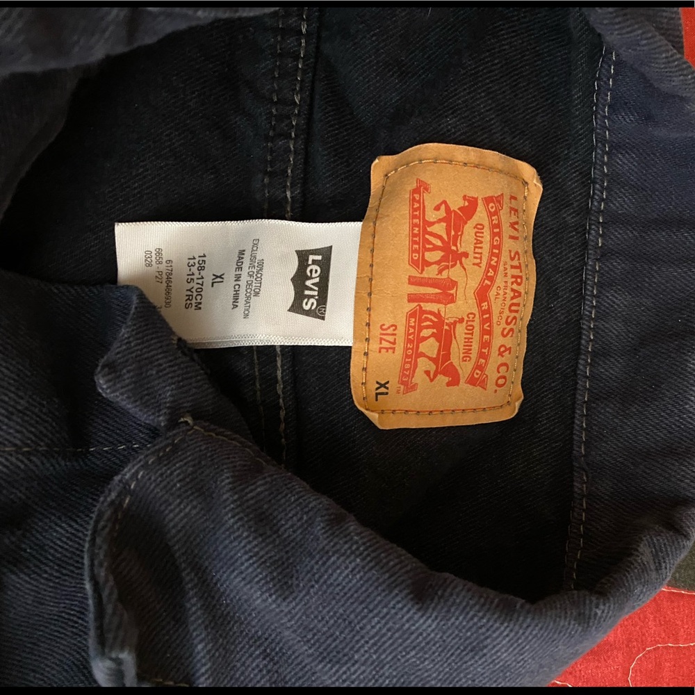 Levi’s blue denim vest/jacket.